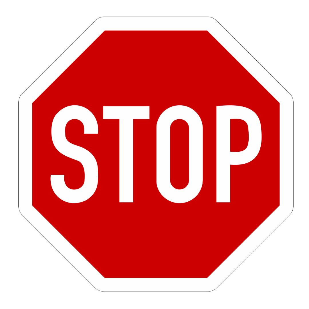 Rotes achteckiges Stopschild mit weißer Umrandung und der Aufschrift „STOP“ als internationales Verkehrszeichen für Halt.